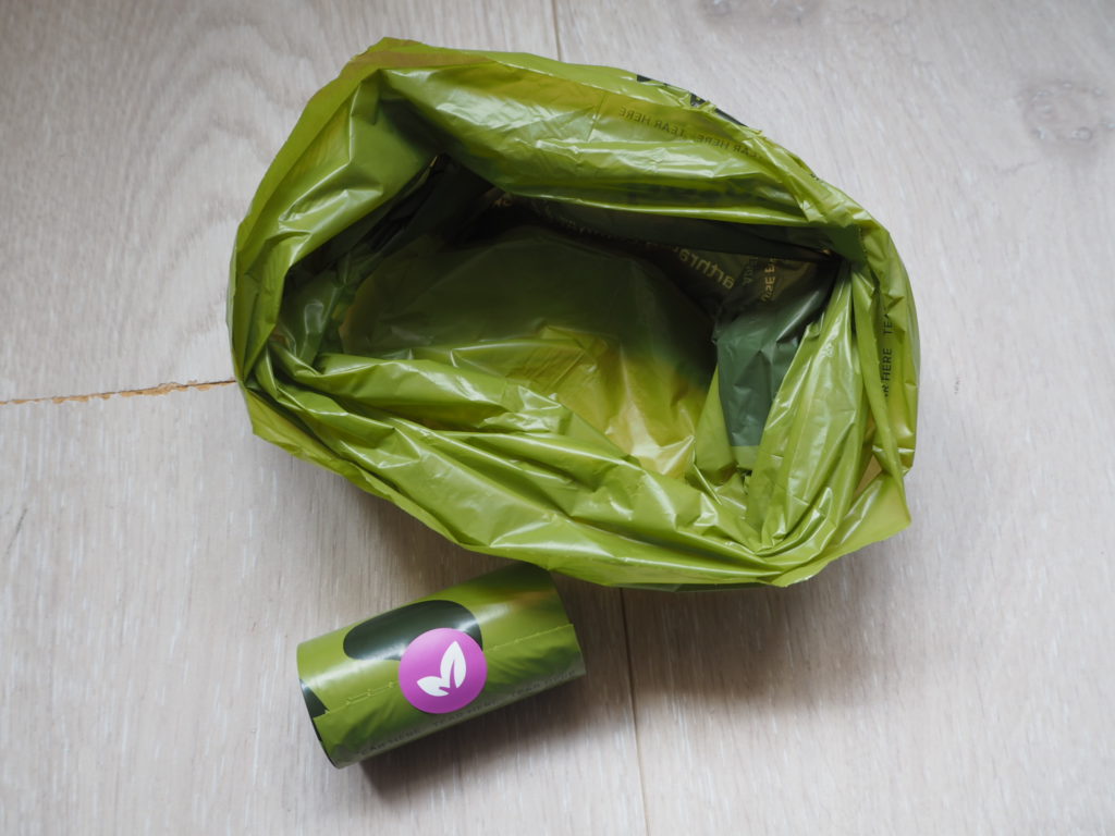 Rolls of Earth Rated Biodegradable Scented Dog Poop Bag and roll of bags