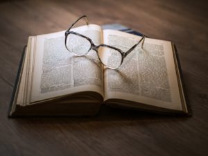glasses with book