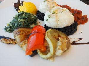 Black risotto seafood dish at restaurant Compte Perast