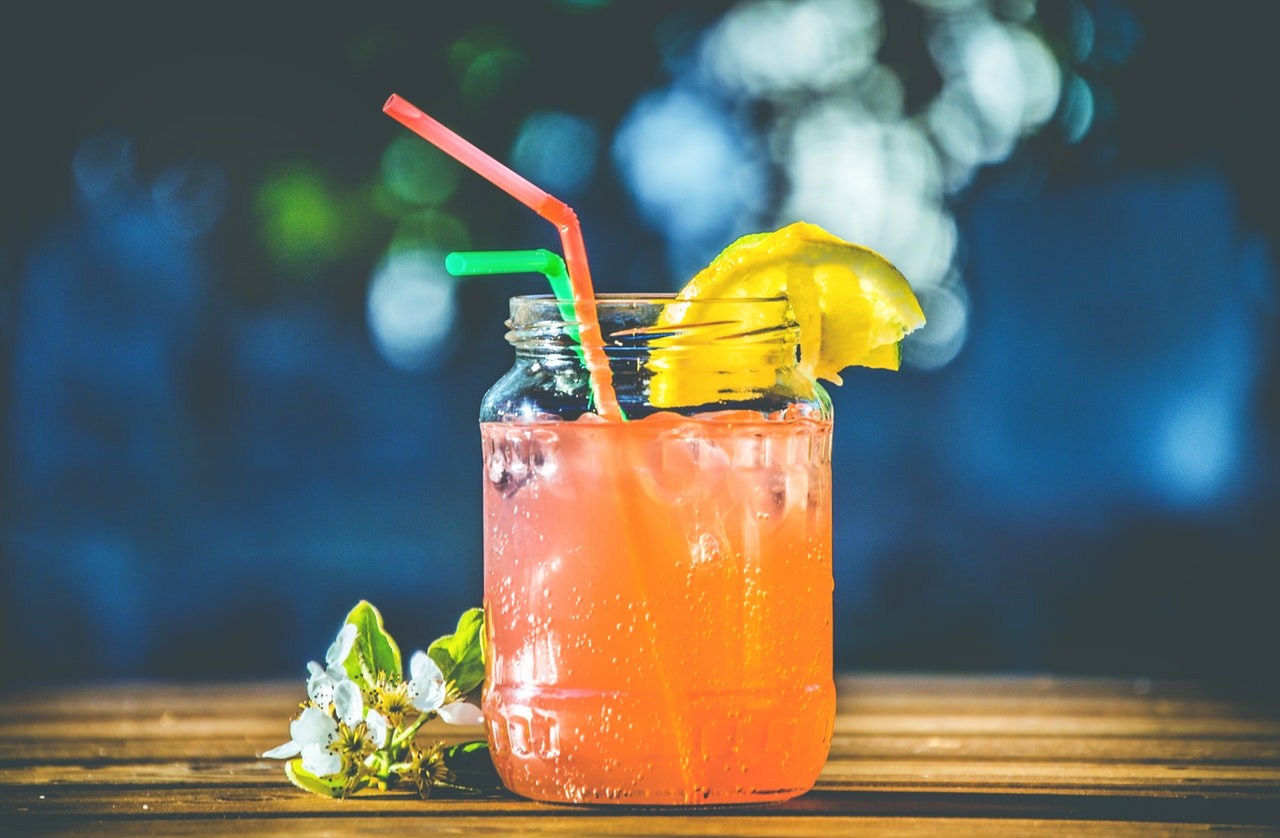 pink cocktail in glass jar