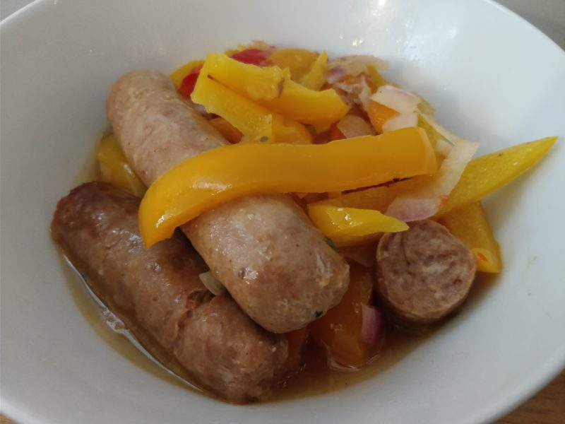 HECK sausages with peppers and onions